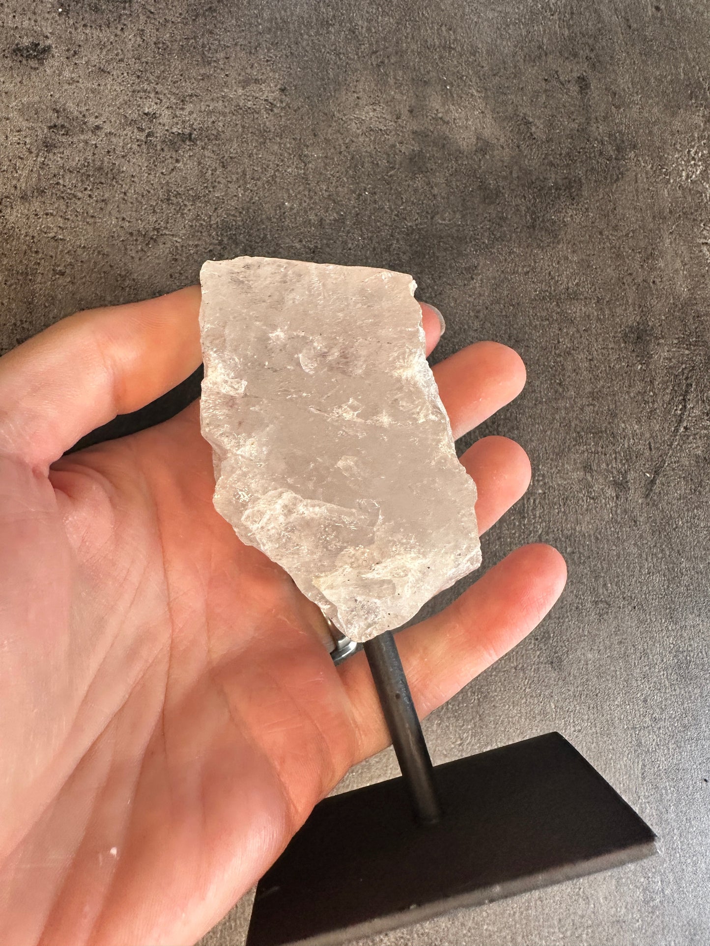Clear quartz - Rough chunk on a stand
