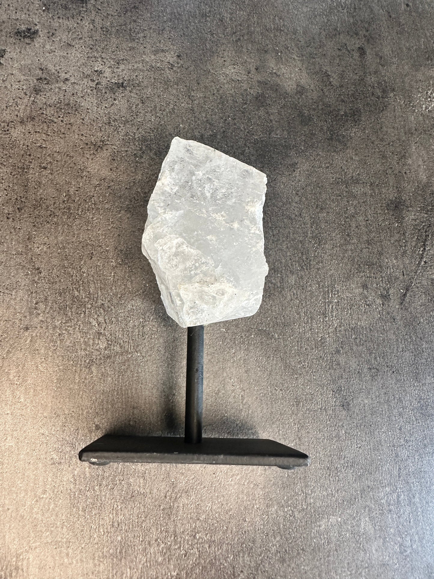 Clear quartz - Rough chunk on a stand