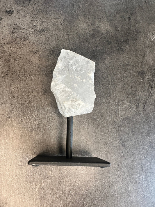 Clear quartz - Rough chunk on a stand